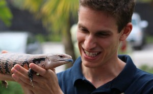 Kenny Coogan holding a captive bred blue tongue skink named Shelia